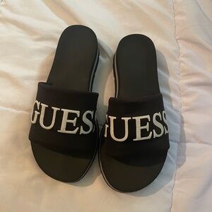 GUESS platform flip flops